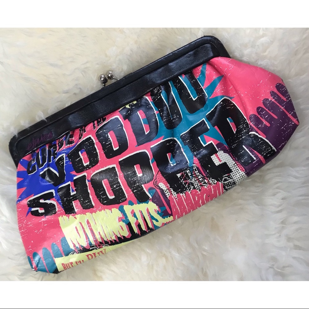 etnies clasp frame clutch purse comic print